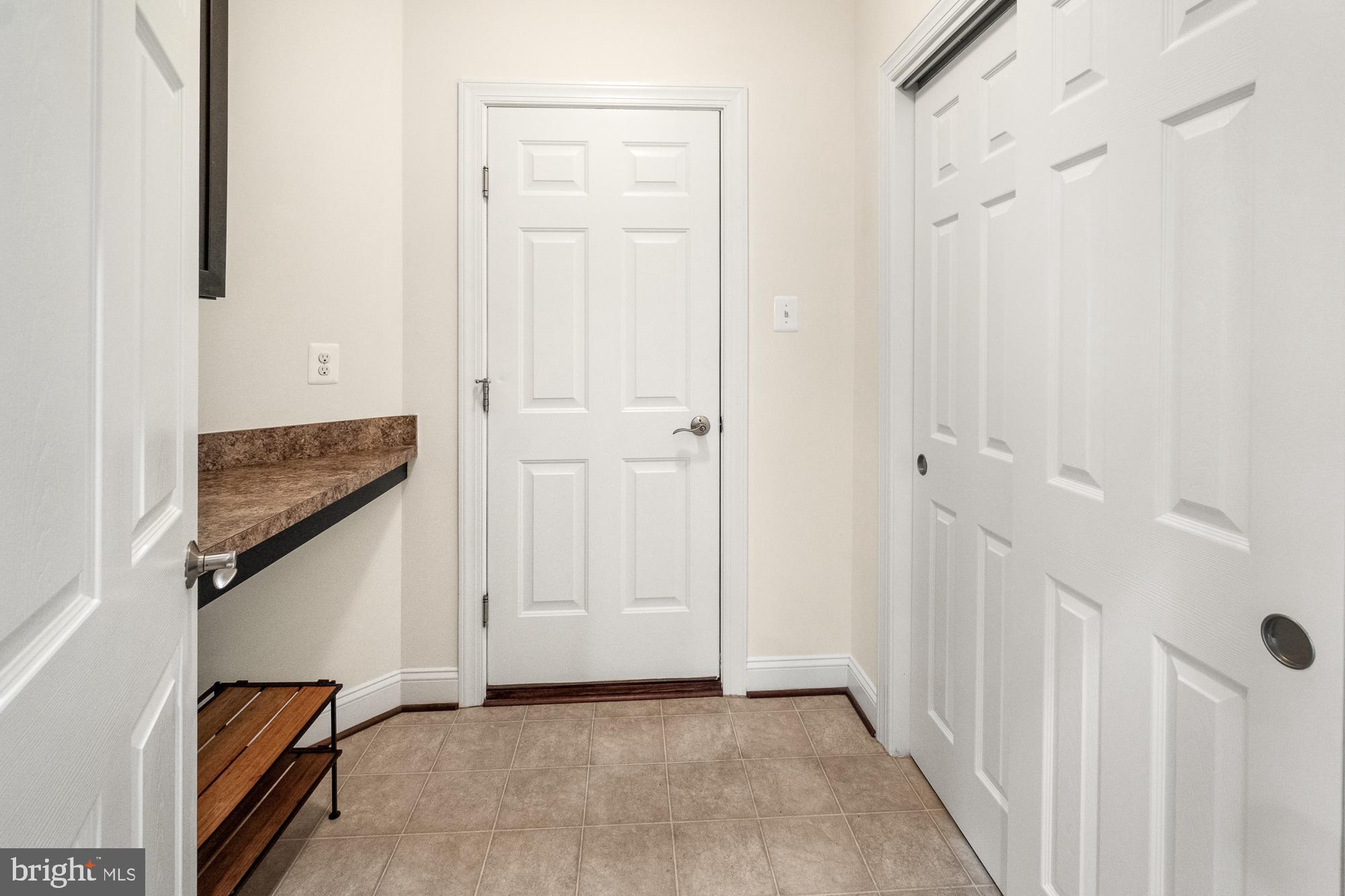 17914 Dr Walling Road Poolesville, MD 20837 - Photo 38 of 86 Mudroom with shelving