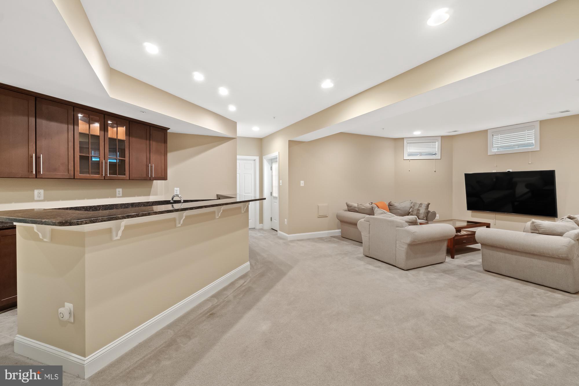 17914 Dr Walling Road Poolesville, MD 20837 - Photo 55 of 86 Finished basement with bar entertainment area!