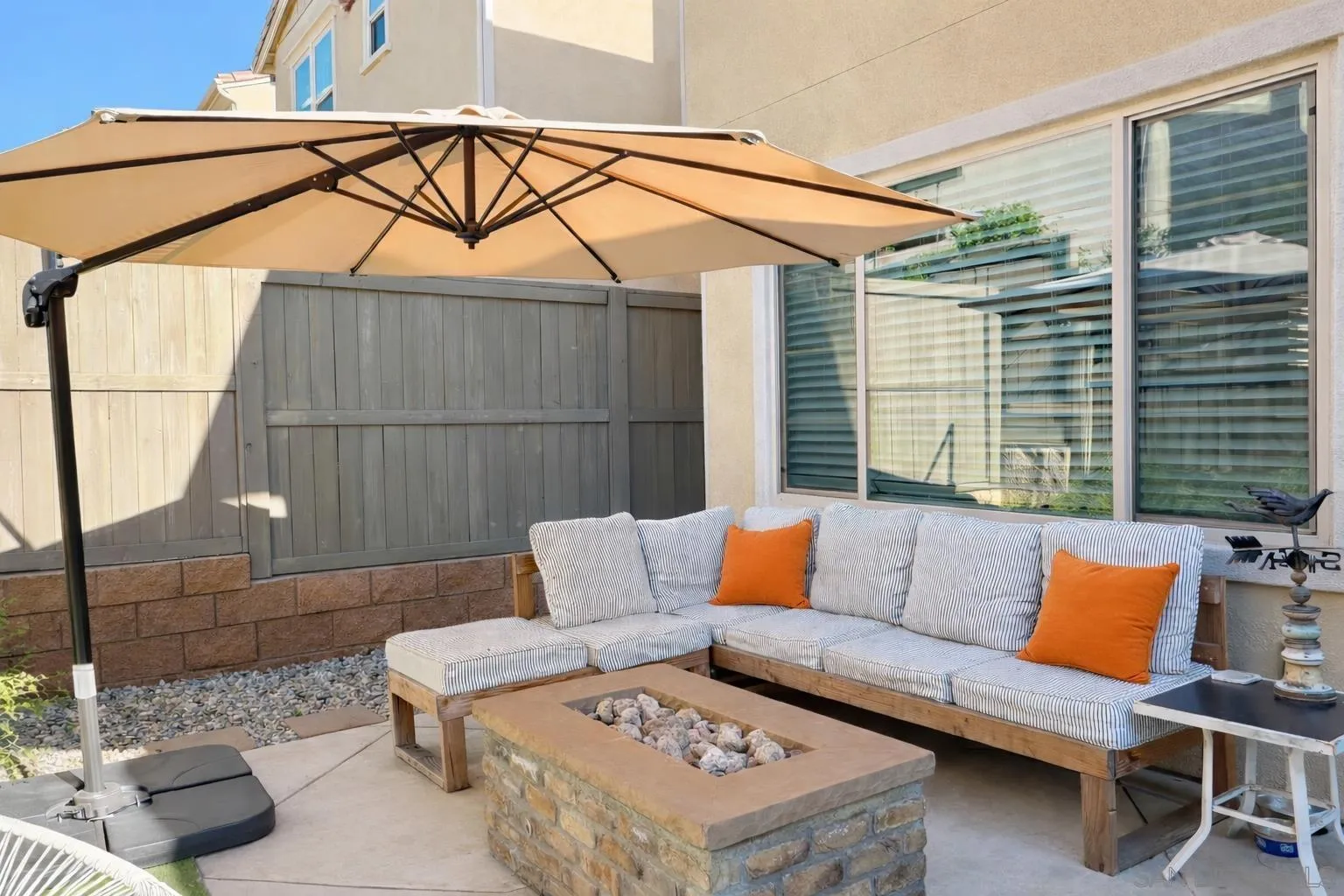 1132 Cherry Tree Lane Vista, CA 92084 - Photo 15 of 26 Private and gated patio is quiet and peaceful with your own upgraded stone gas powered fire pit