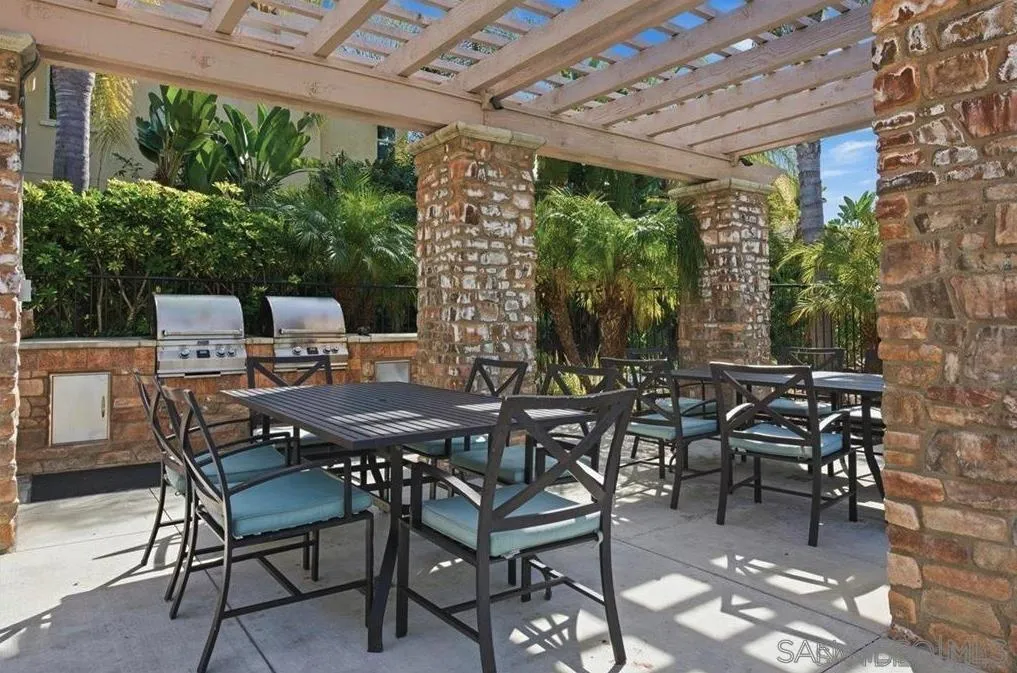 1132 Cherry Tree Lane Vista, CA 92084 - Photo 18 of 26 Wrought iron and padded seating for groups in the entertainment area - great accommodations for friends and family gatherings