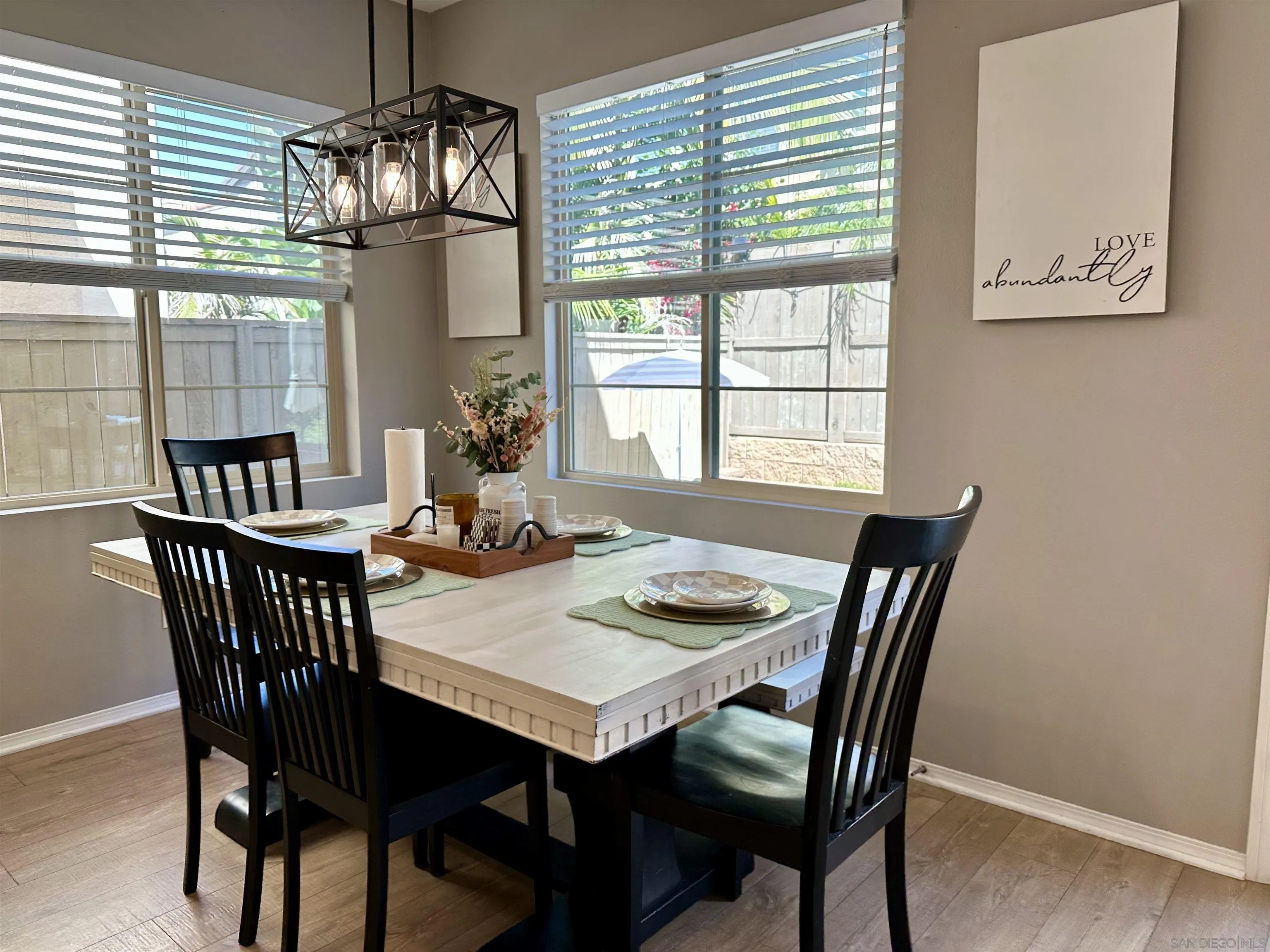 1132 Cherry Tree Lane Vista, CA 92084 - Photo 7 of 28 Dining area has designer lighting and views to kitchen and backyard