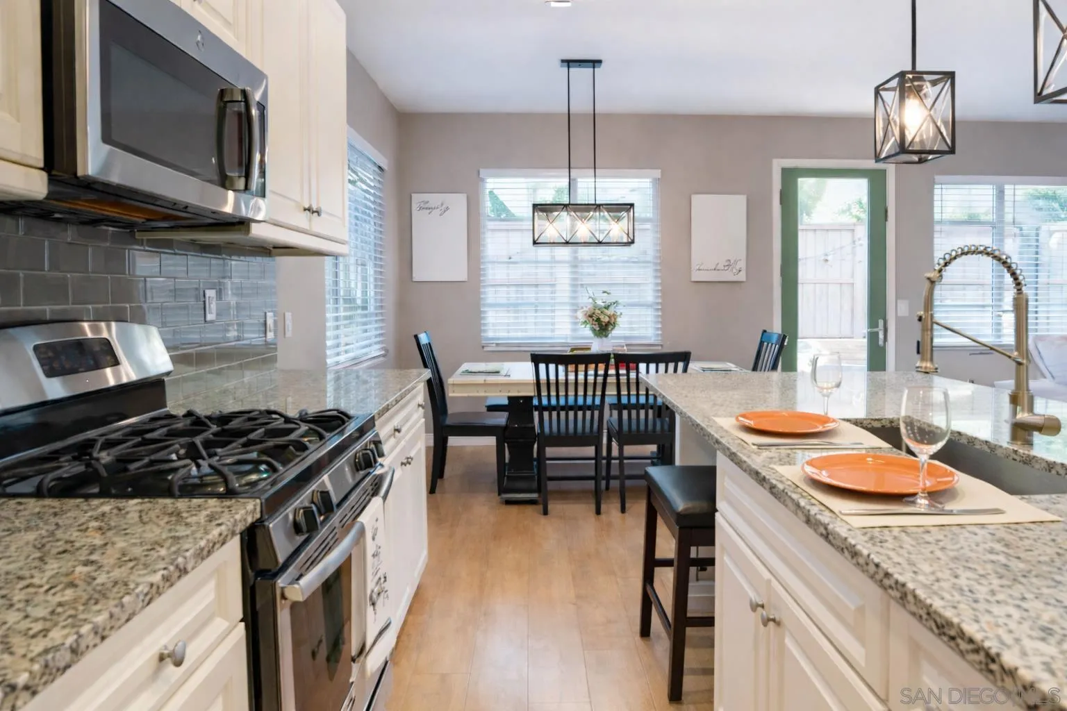 1132 Cherry Tree Lane Vista, CA 92084 - Photo 25 of 26 Granite counters, soft close drawers, tons of natural light, open floor plan and a sink in the center island for convenient cooking and prep!