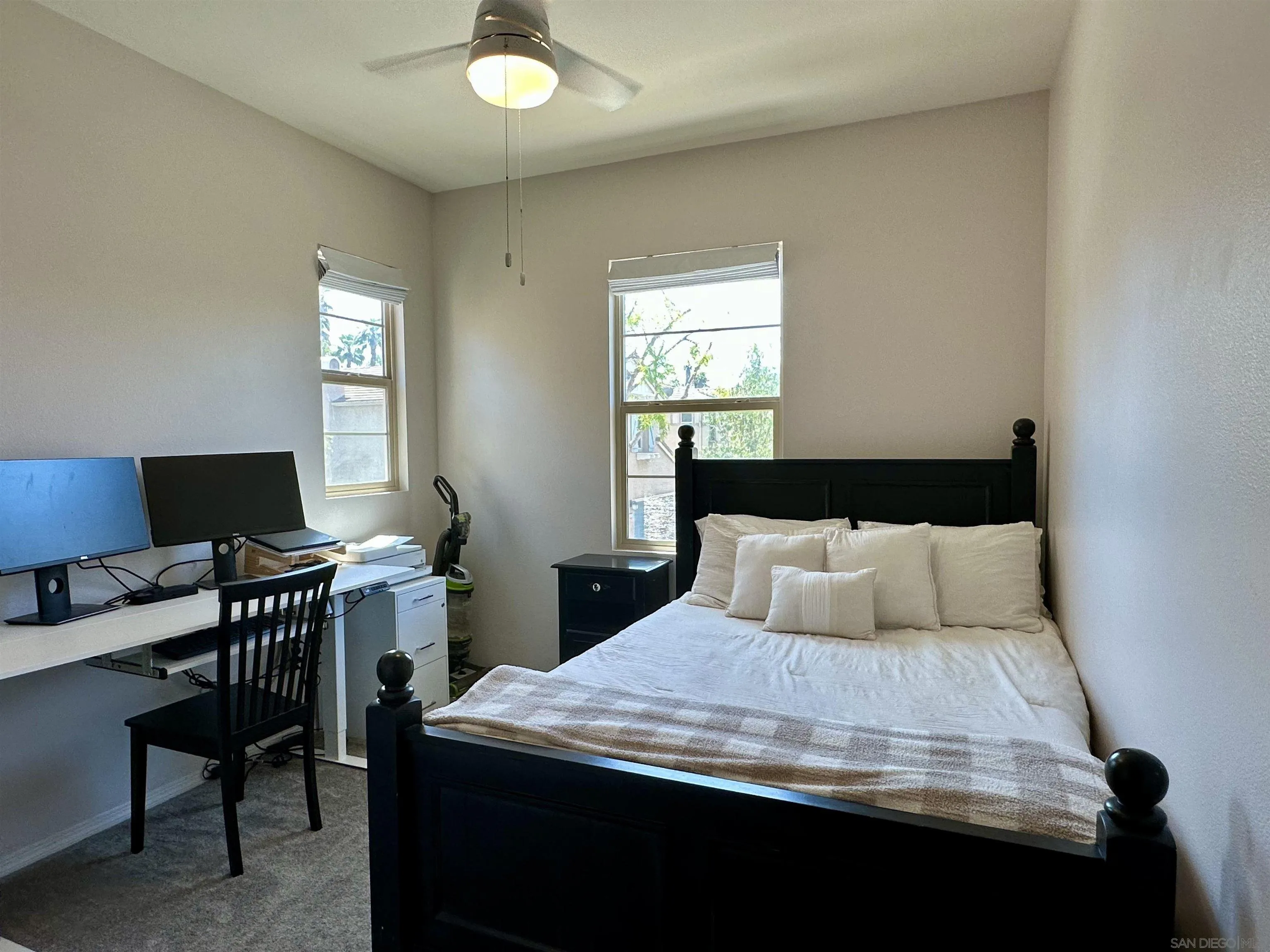 1132 Cherry Tree Lane Vista, CA 92084 - Photo 8 of 28 Bedroom 2 is also 10 x 10, sunkissed from the south so it stays cool and has an upgraded, lighted ceiling fan