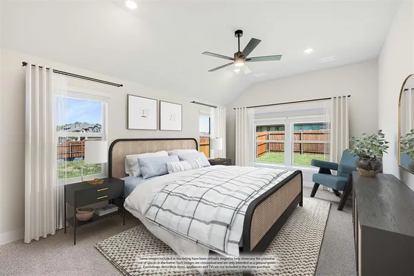 a view of a livingroom with a ceiling fan and window