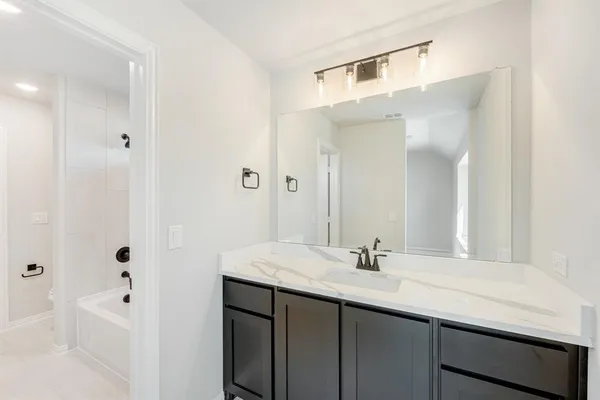 a bathroom with a bathtub