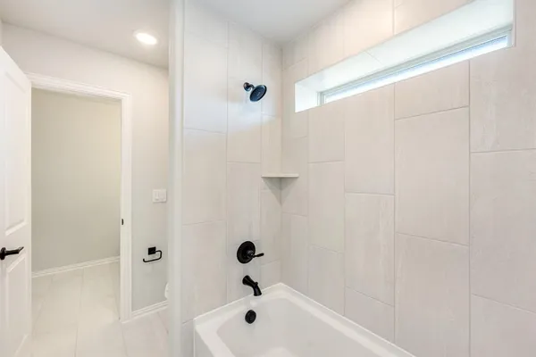 a bathroom with a sink double vanity and a mirror