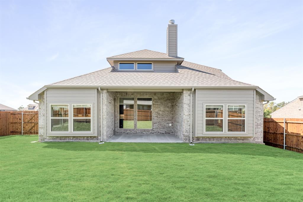 1025 Raptor Road Alvarado, TX 76009 - Photo 38 of 40 a front view of a house with garden