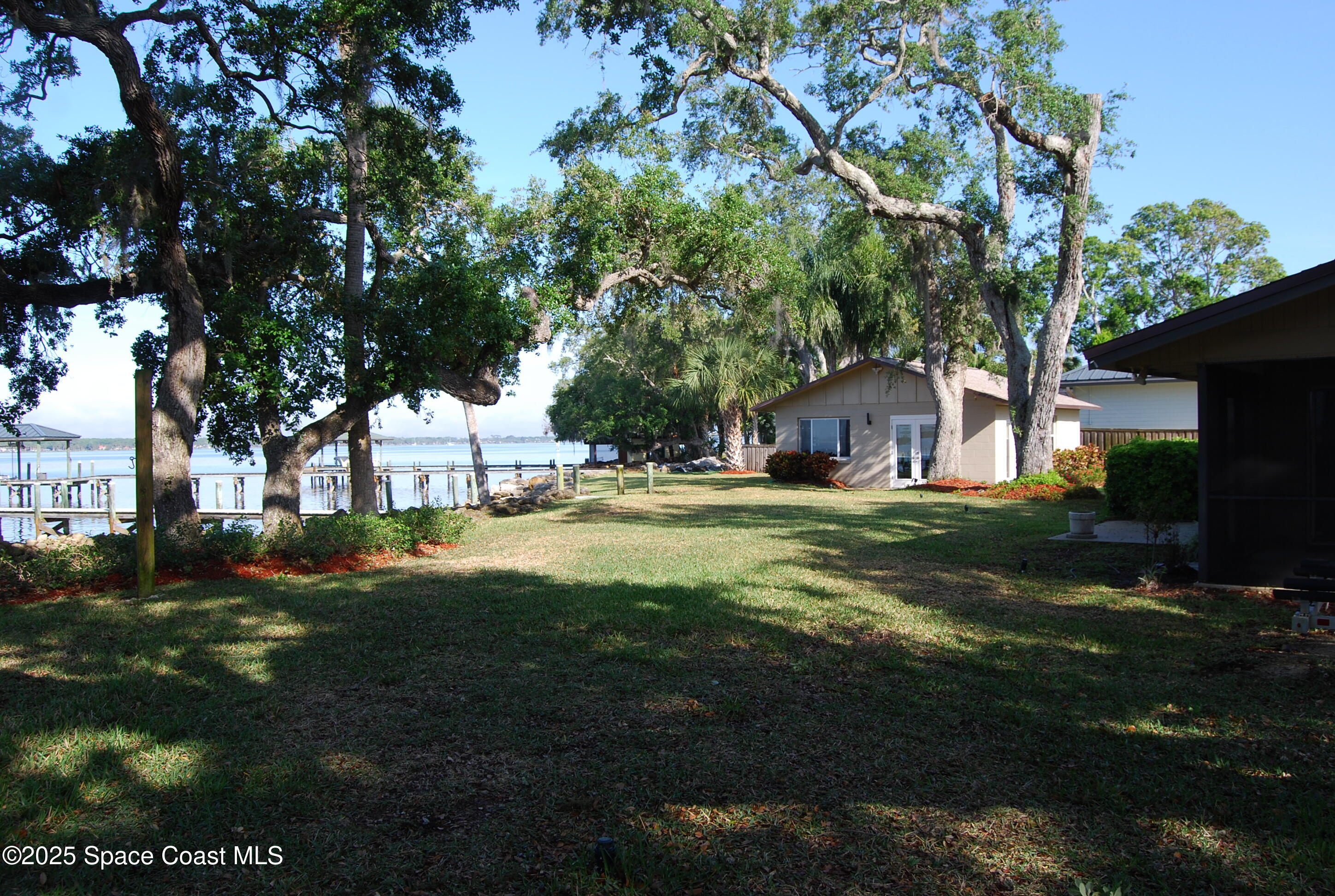 4285 Randon Lane Merritt Island, FL 32952 - Photo 3 of 24 3randon sideyard