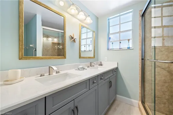 a bathroom with a shower and toilet