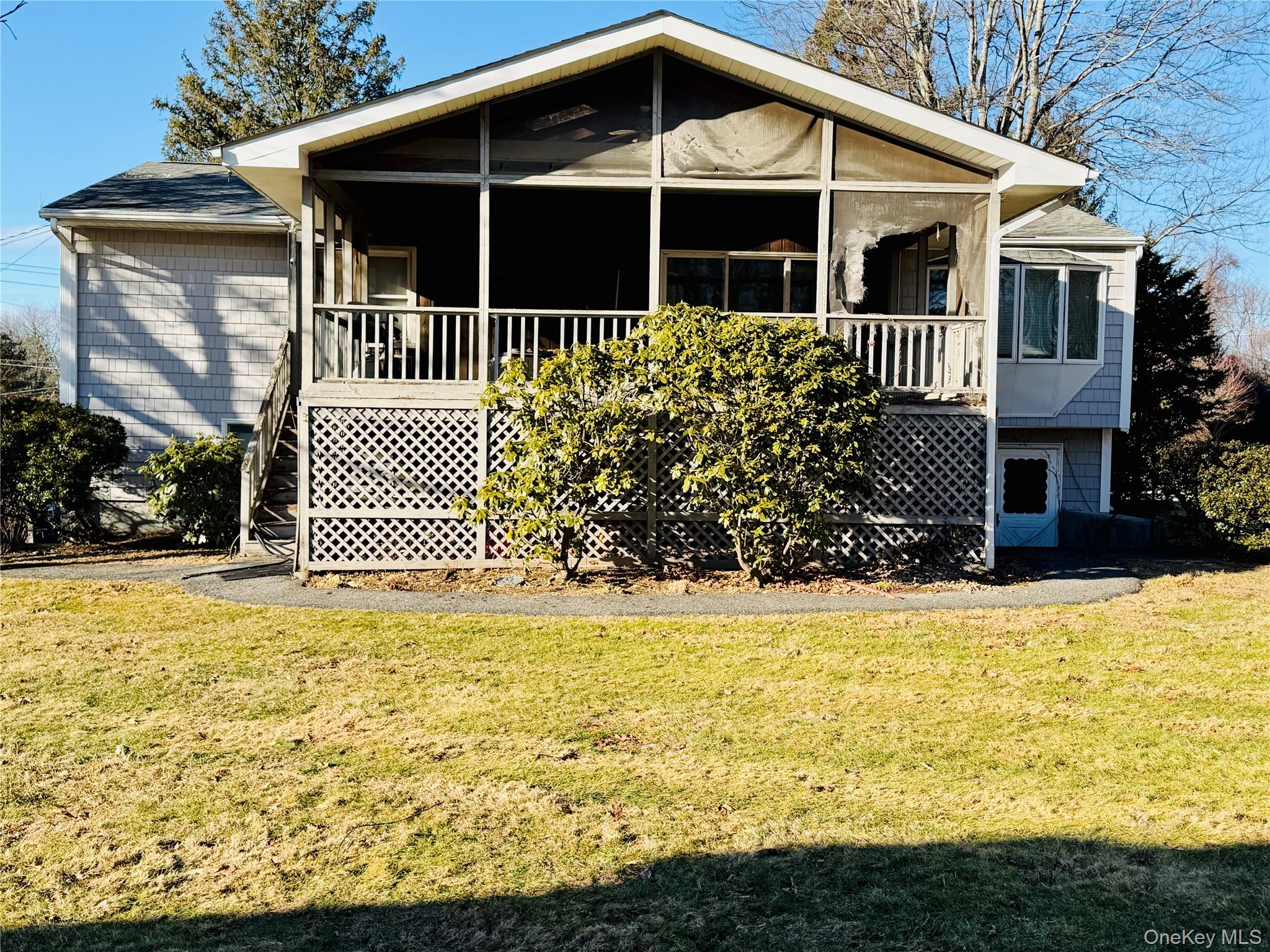 110 Wayacross Road Mahopac, NY 10541 - Photo 6 of 29 a front view of a house with a yard