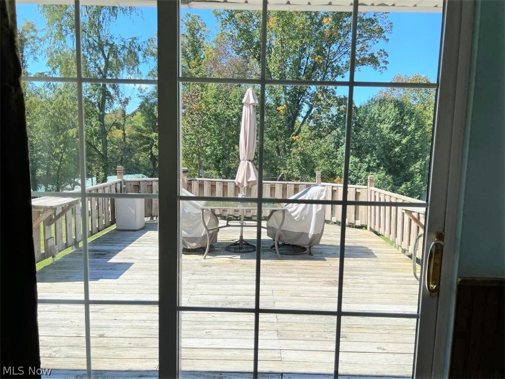 3080 Dutch Ridge Road Parkersburg, WV 26104 - Photo 6 of 29 These sliders doors are in the dining area and lead outside to the large deck area where you can enjoy outside dining as well.