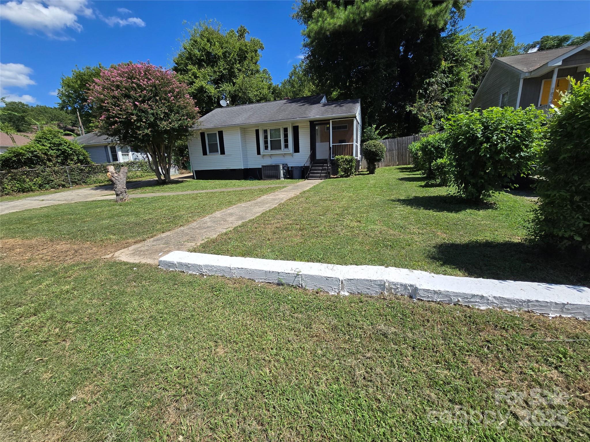 1900 Double Oaks Road Charlotte, NC 28206 - Photo 22 of 22 a view of house with outdoor space and garden