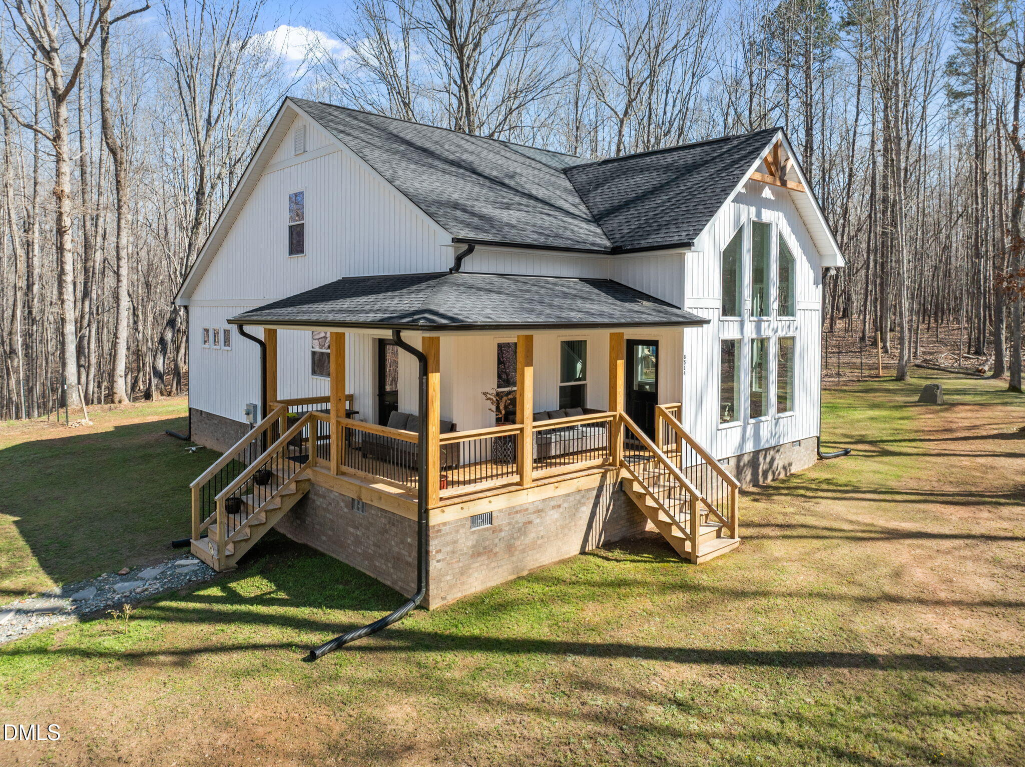 8514 Charlie Stovall Road Roxboro, NC 27574 - Photo 7 of 48 a view of a house with backyard