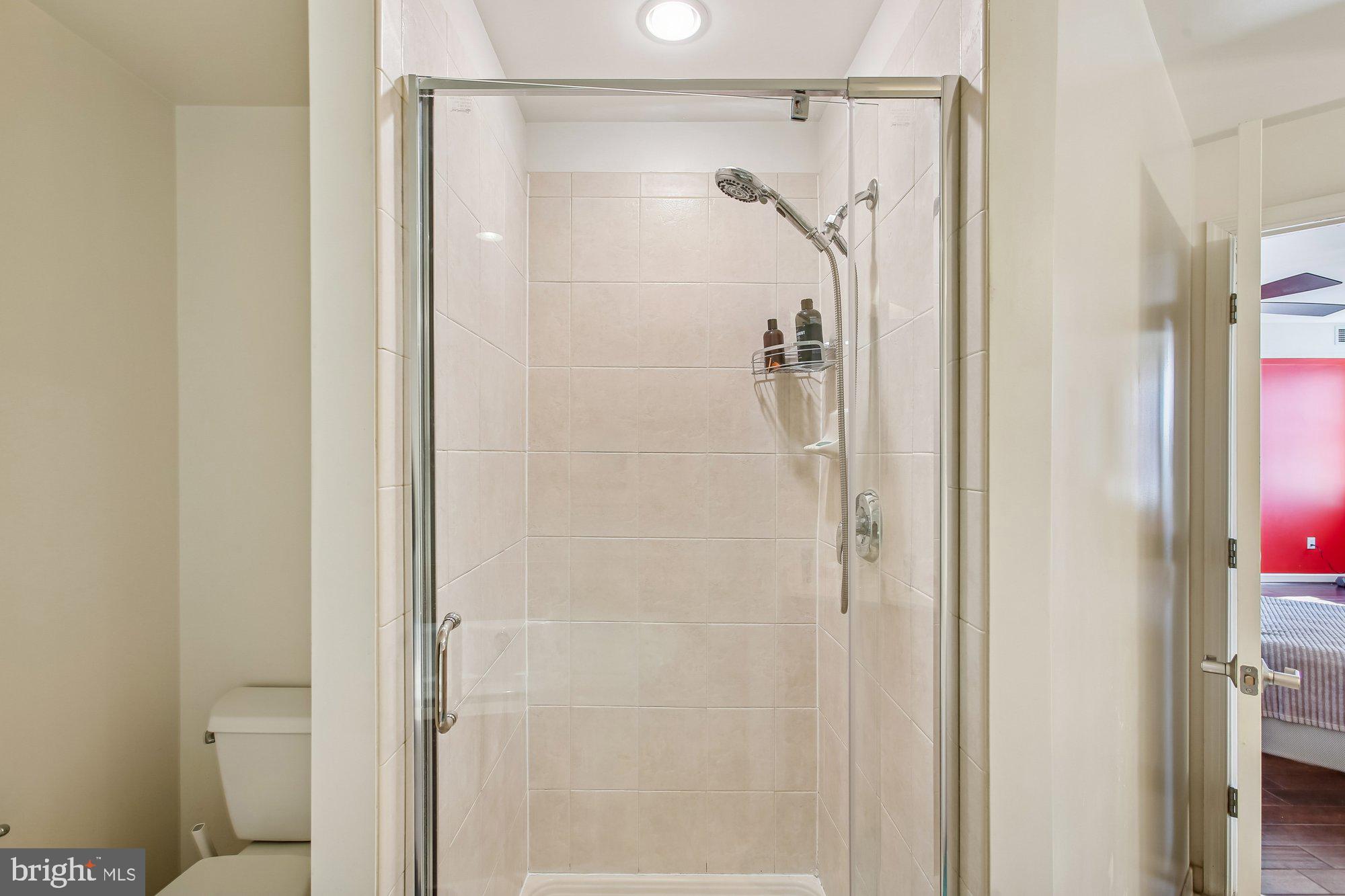 1830 Fountain Drive, Unit 1006 Reston, VA 20190 - Photo 12 of 33 Primary Bath Walk-in Shower