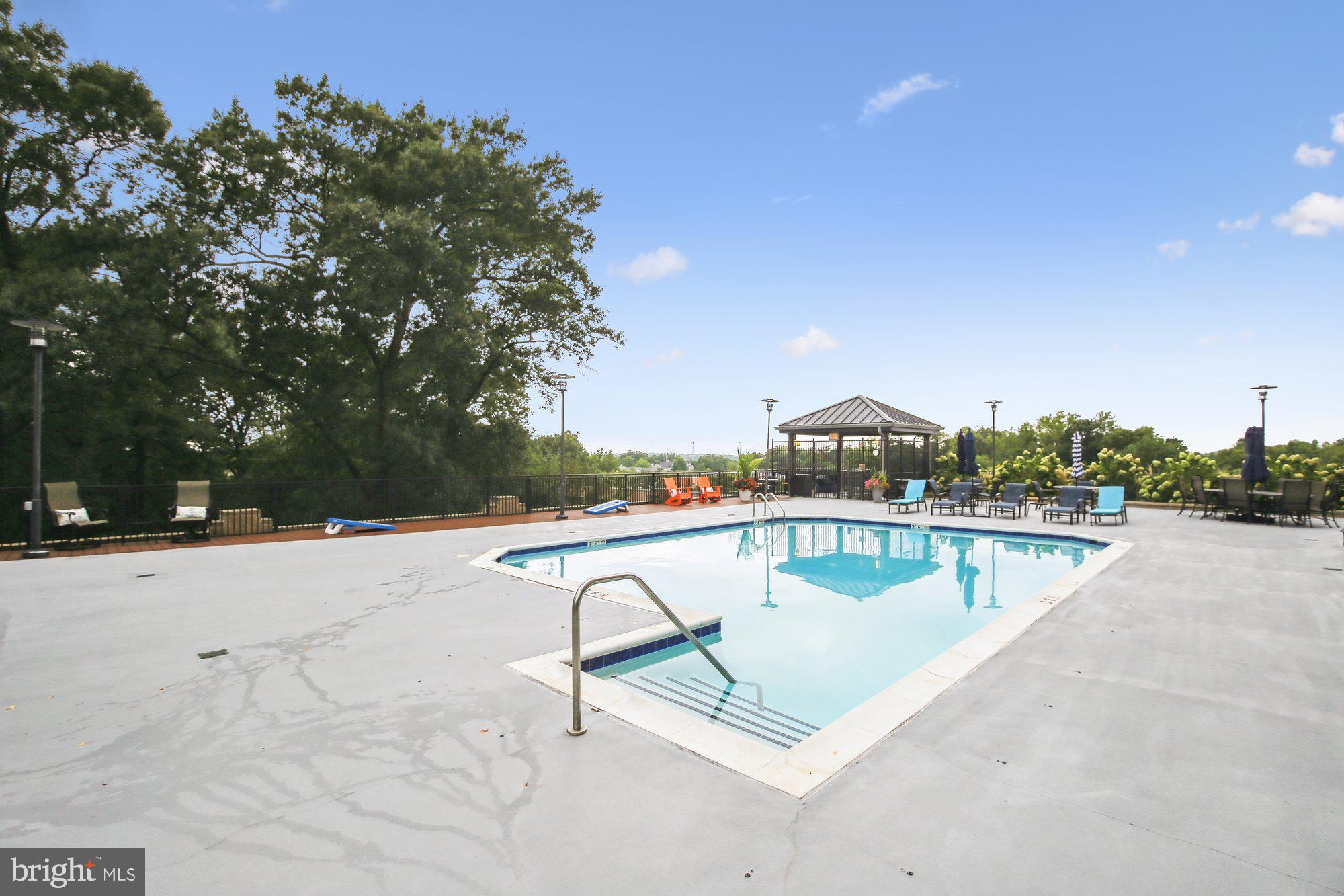 1830 Fountain Drive, Unit 1006 Reston, VA 20190 - Photo 22 of 33 Pool Showing Corn Hole