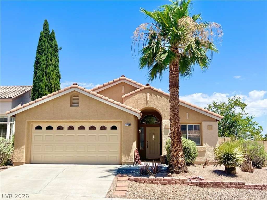 9708 Ridge Creek Place Las Vegas, NV 89134 - Photo 1 of 34 Welcome to Your New Home! Freshly painted with a two-car garage and mature desert landscaping offers delightful curb appeal.