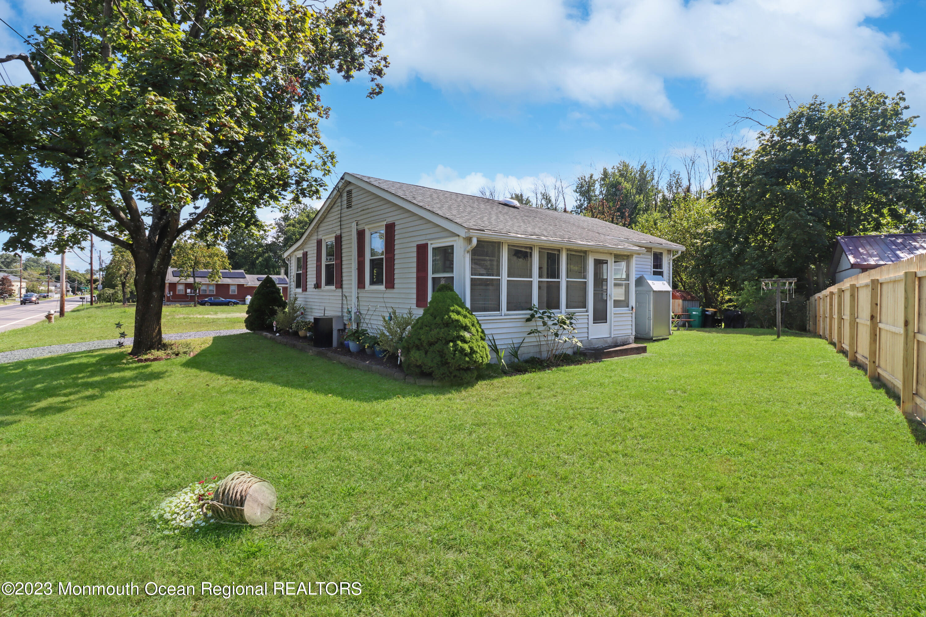 a backyard of a house with lots of green space