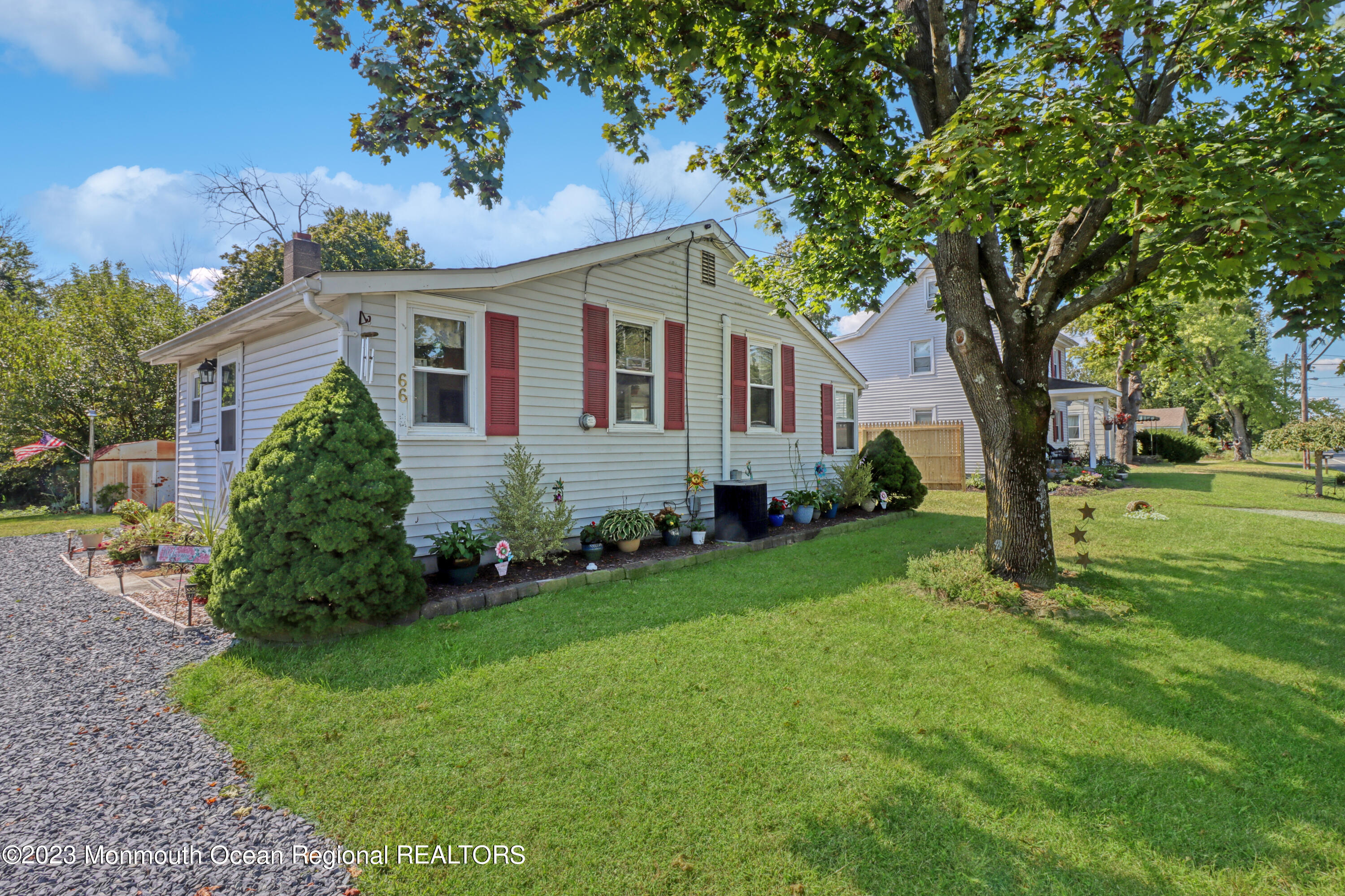 66 Jacobstown Road New Egypt, NJ 08533 - Photo 2 of 39 a front view of a house with a yard