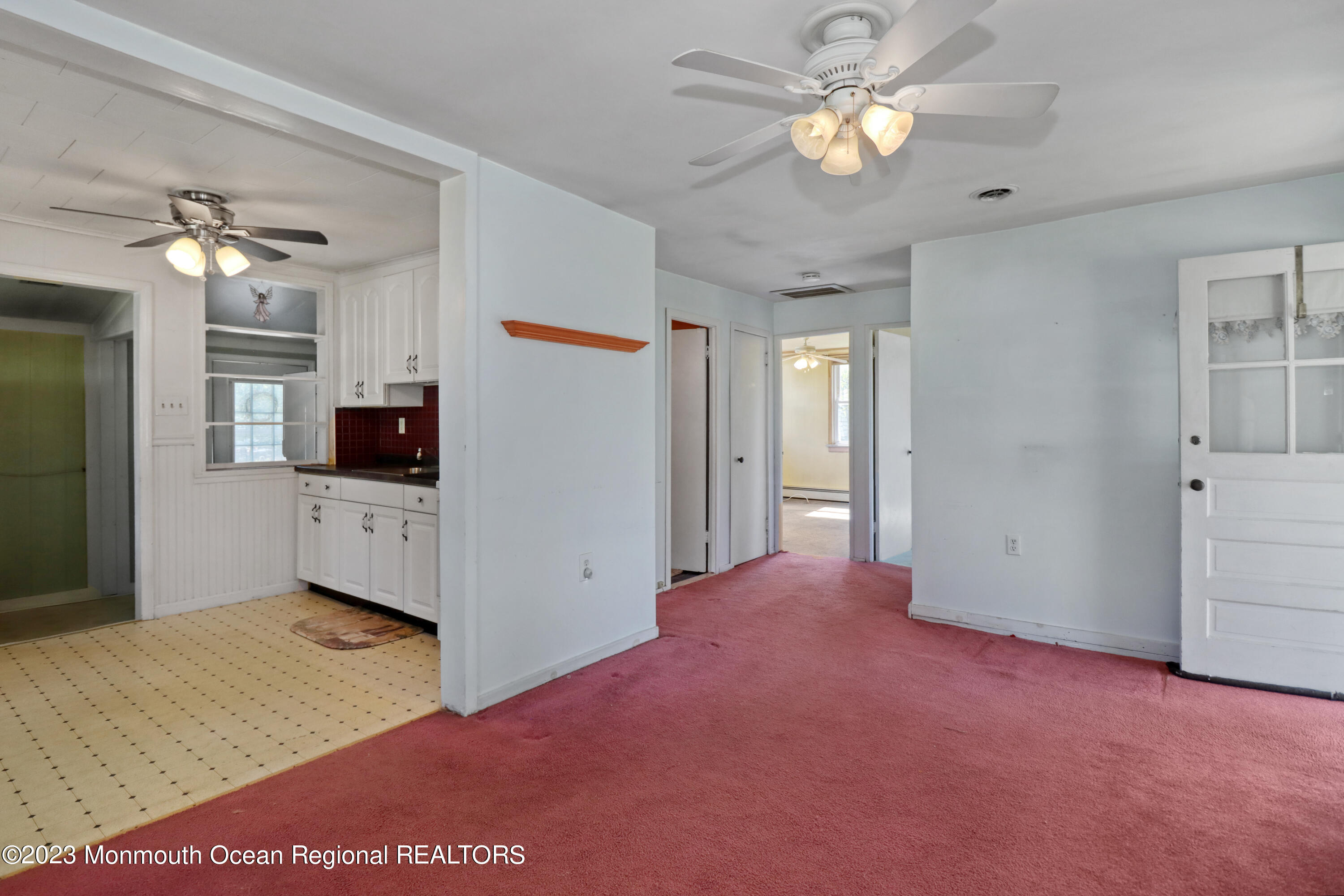 66 Jacobstown Road New Egypt, NJ 08533 - Photo 22 of 39 a view of a room with chandelier fan and kitchen view