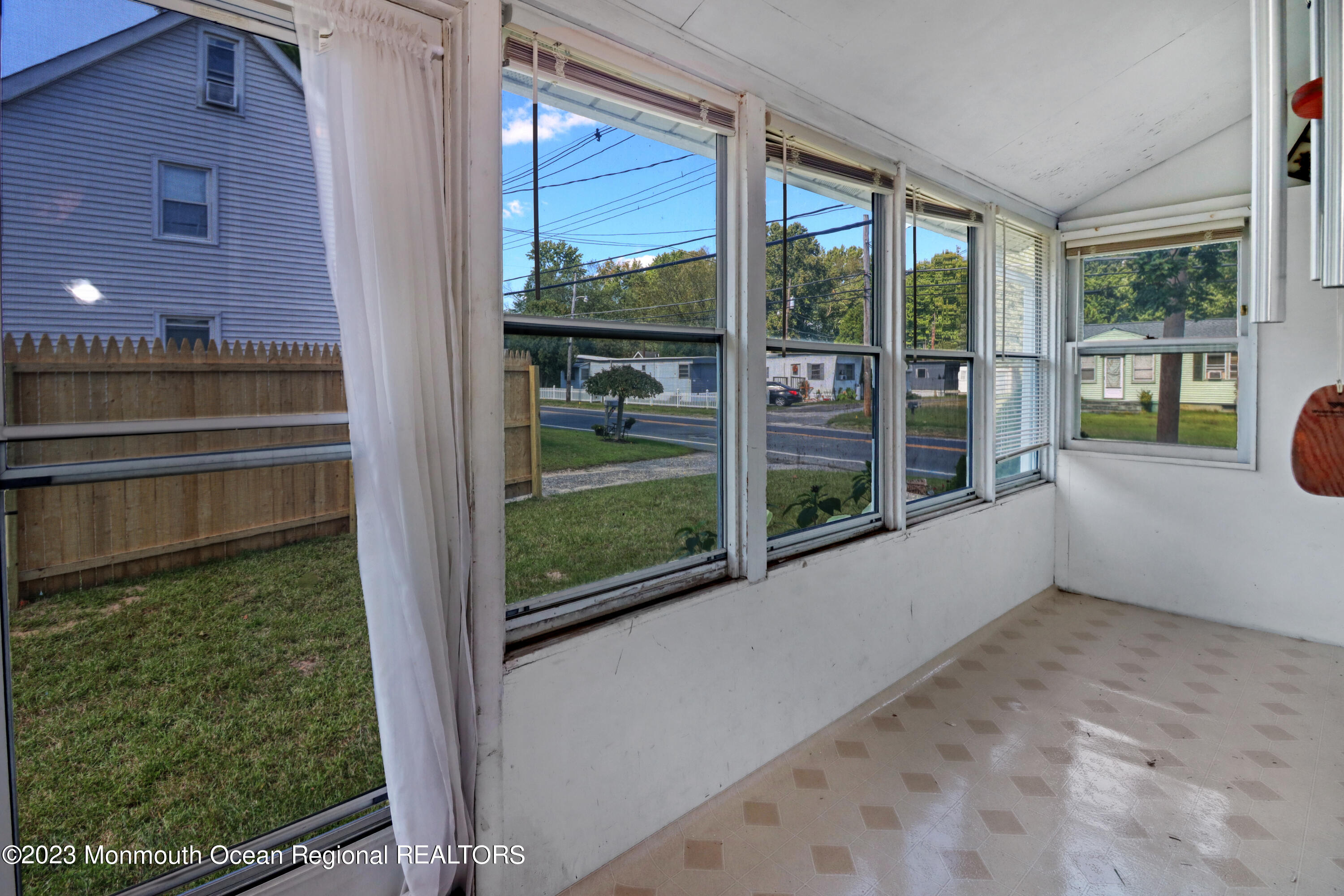 66 Jacobstown Road New Egypt, NJ 08533 - Photo 25 of 39 a view of backyard with large window and wooden floor