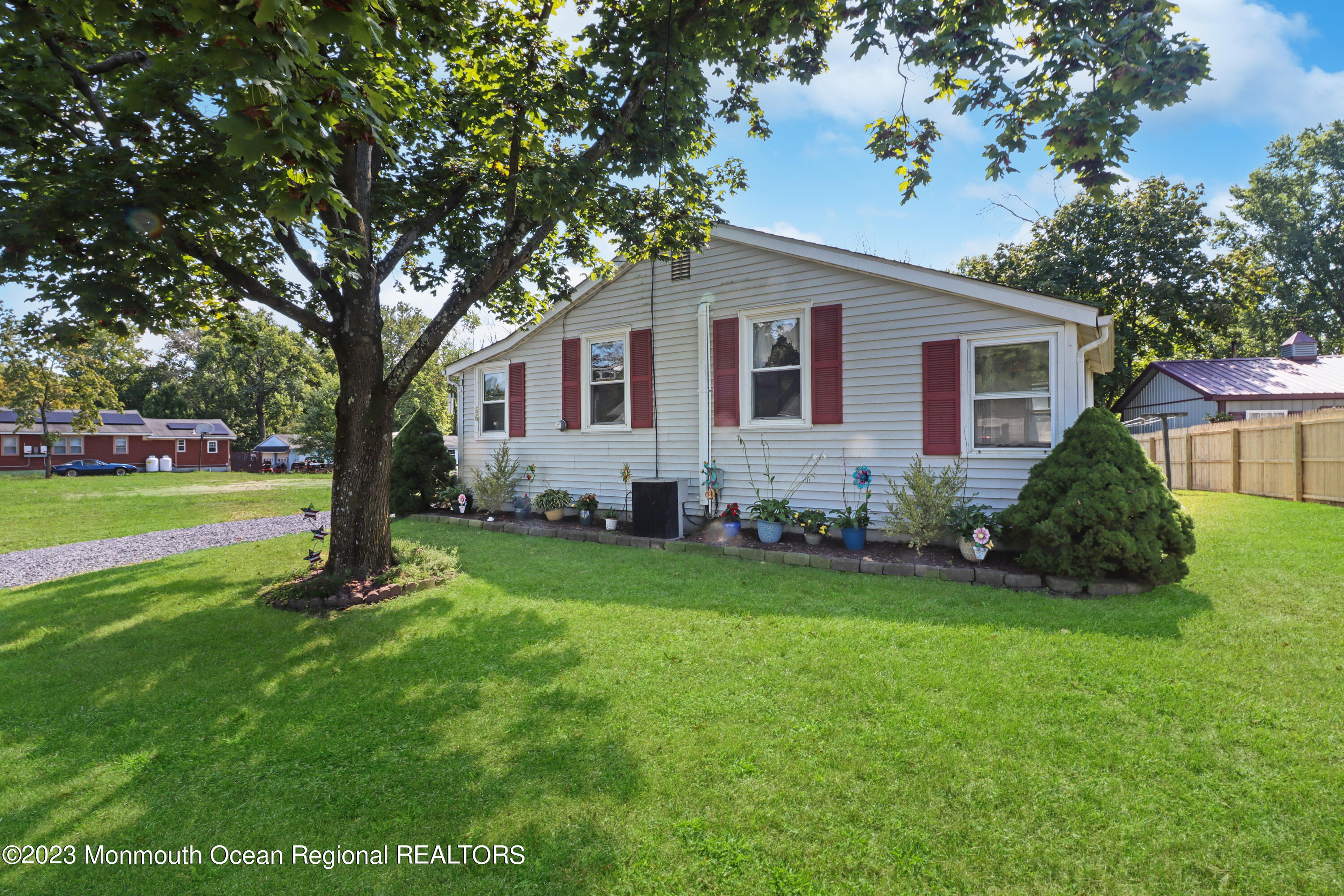 66 Jacobstown Road New Egypt, NJ 08533 - Photo 3 of 39 a front view of house with yard and green space