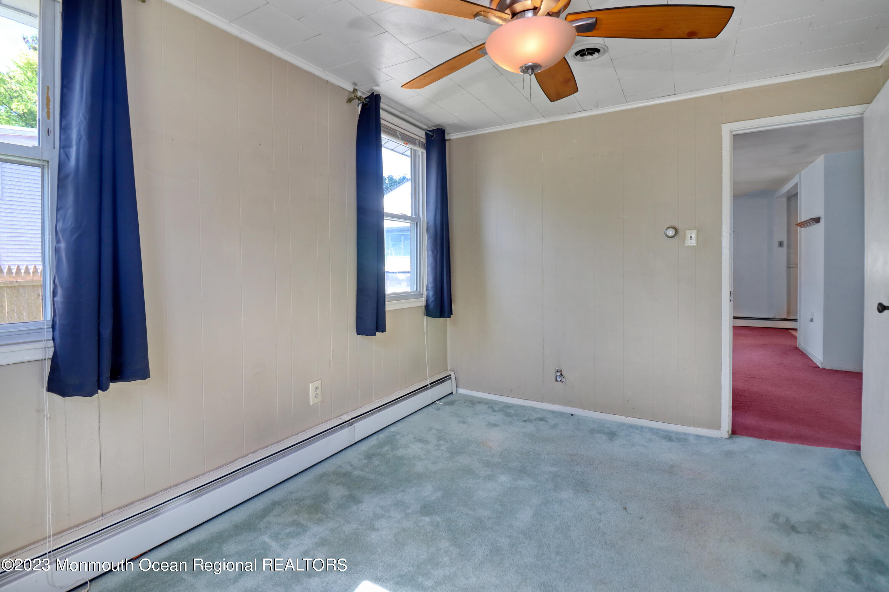 66 Jacobstown Road New Egypt, NJ 08533 - Photo 34 of 39 an empty room with windows and fan