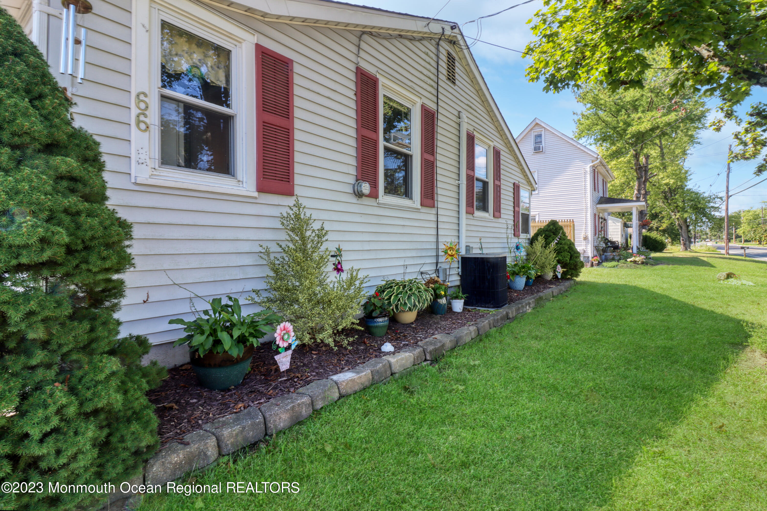 66 Jacobstown Road New Egypt, NJ 08533 - Photo 8 of 39 a front view of a house with a garden