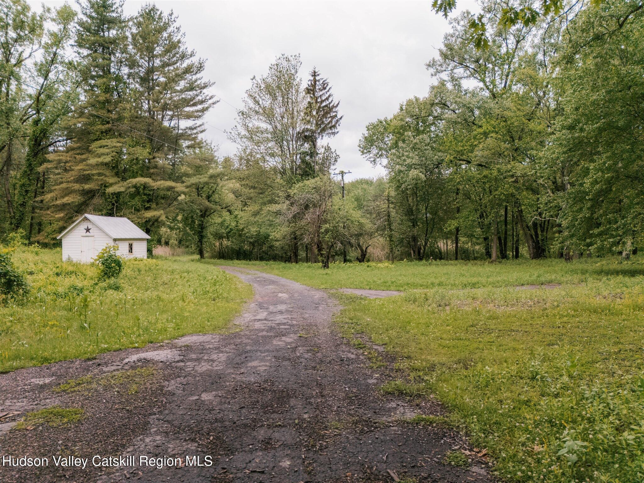 37-60 Blackburn Road Selkirk, NY 12158 - Photo 28 of 39 a view of a field with trees in the background