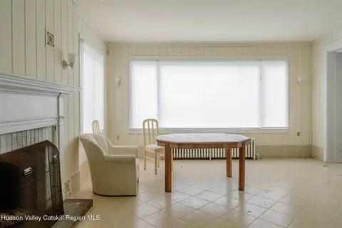 an entryway with wooden floor