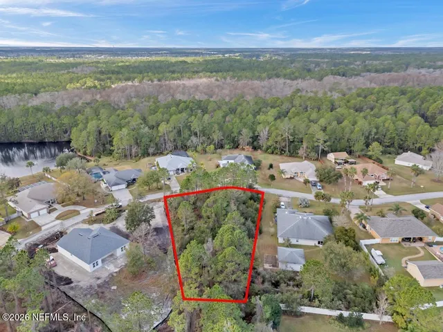 an aerial view of residential house with outdoor space