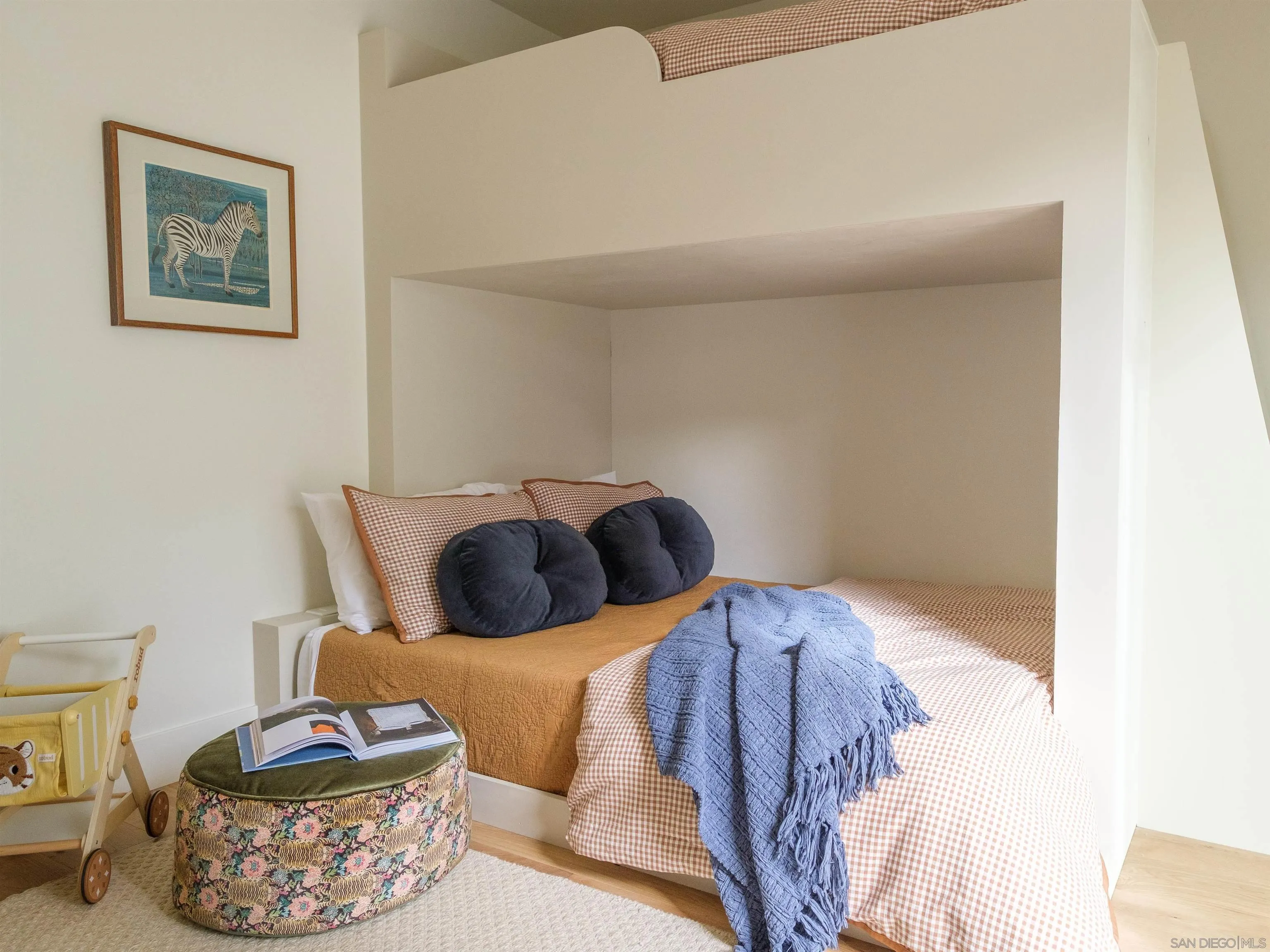 1915 Montgomery Avenue Cardiff-by-the-Sea, CA 92007 - Photo 19 of 32 a living room with furniture and a lamp