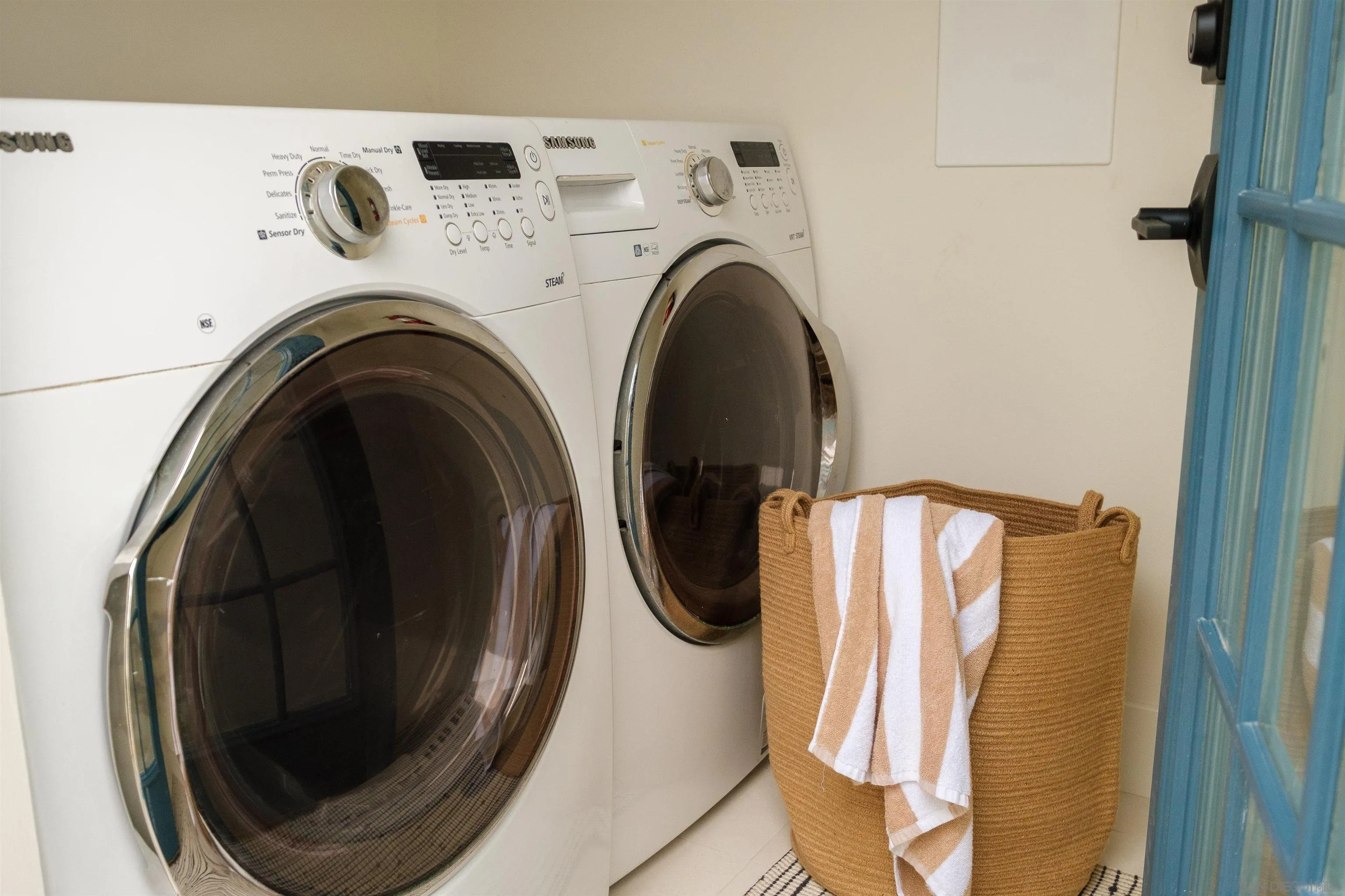1915 Montgomery Avenue Cardiff-by-the-Sea, CA 92007 - Photo 21 of 32 a utility room with dryer and washer