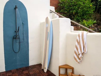 a view of balcony with wooden floor