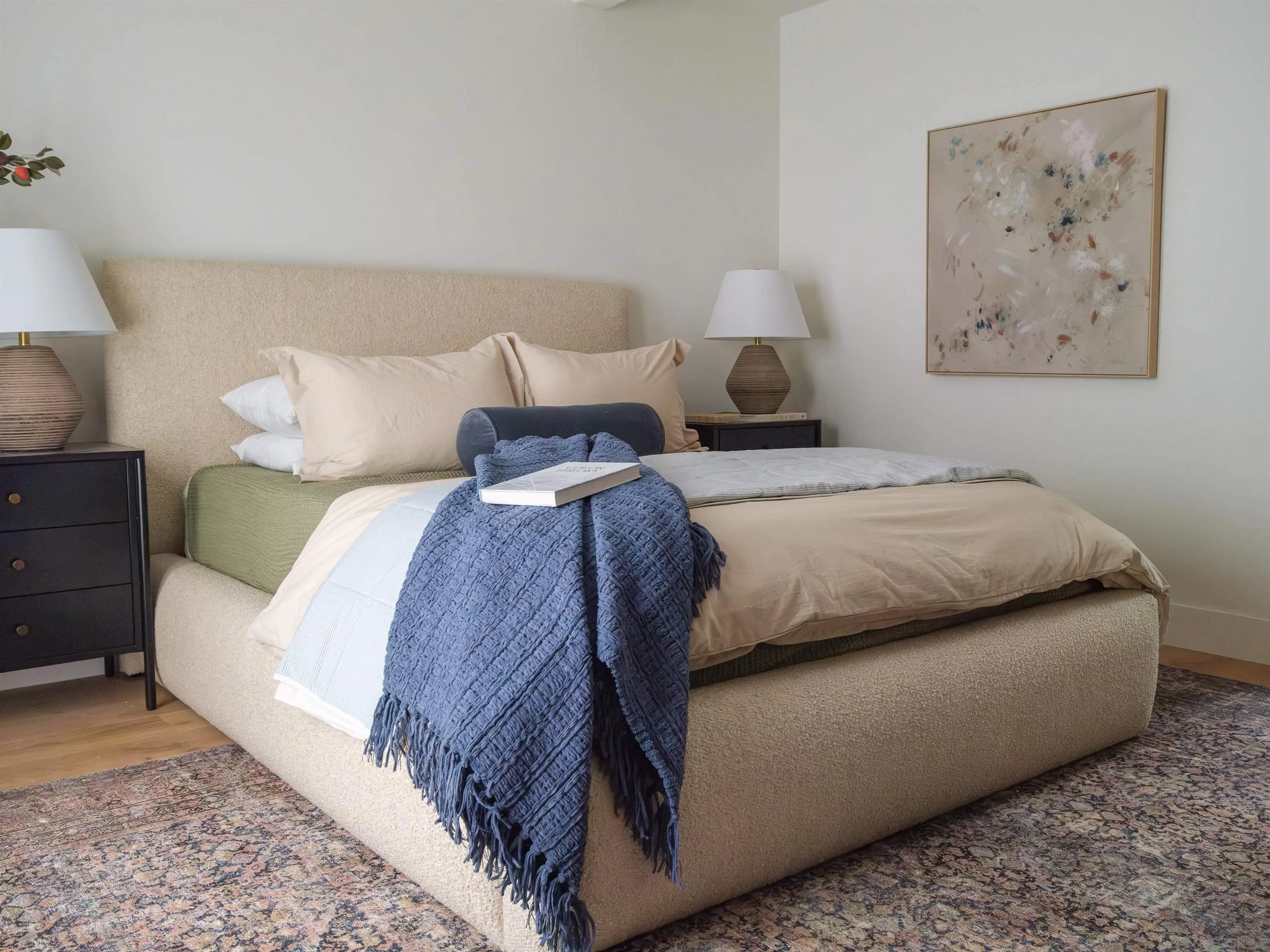 1915 Montgomery Avenue Cardiff-by-the-Sea, CA 92007 - Photo 26 of 32 a bedroom with a bed and painting on the wall