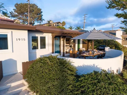 a view of a building with a garden