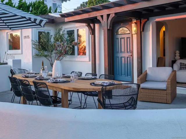 a outdoor living space with furniture and a potted plant