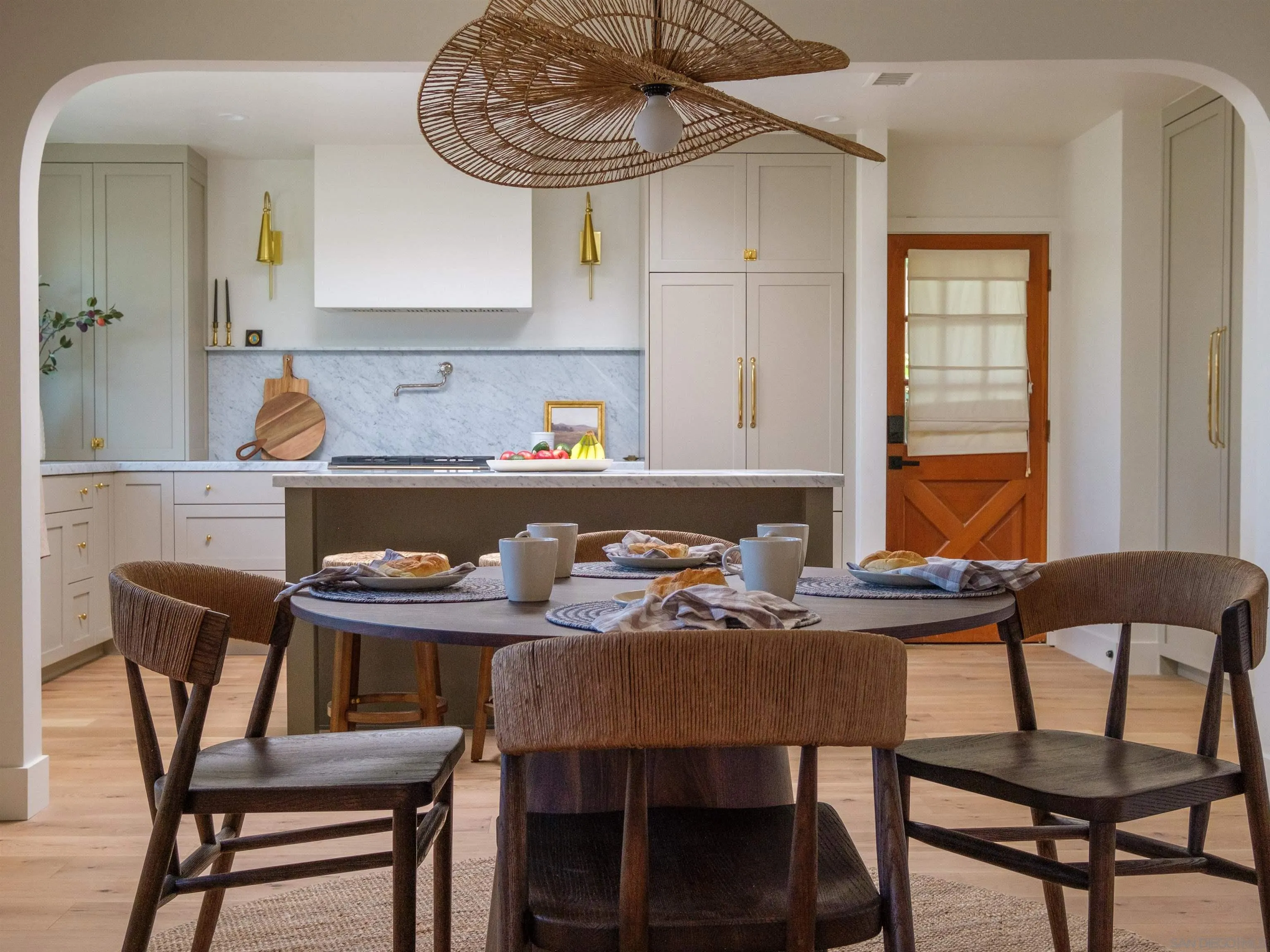 1915 Montgomery Avenue Cardiff-by-the-Sea, CA 92007 - Photo 8 of 32 a dining room with furniture and window