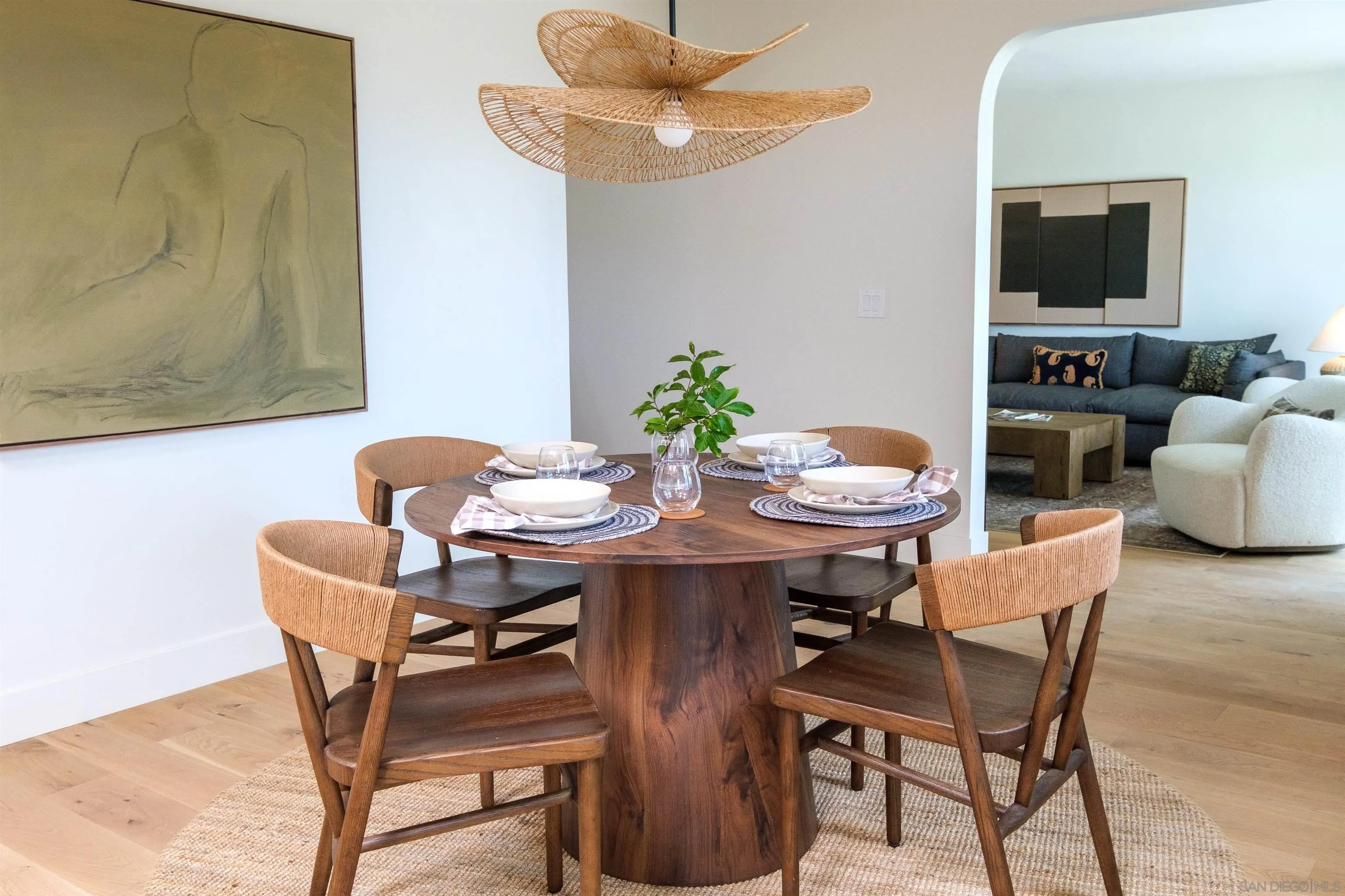 1915 Montgomery Avenue Cardiff-by-the-Sea, CA 92007 - Photo 9 of 32 a view of a dining room with furniture and a flat screen tv