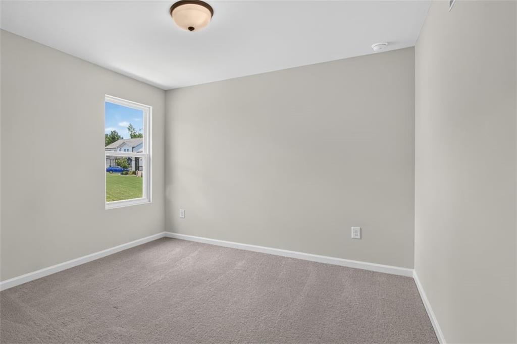 107 Ledgemont Way Acworth, GA 30101 - Photo 32 of 57 an empty room with windows