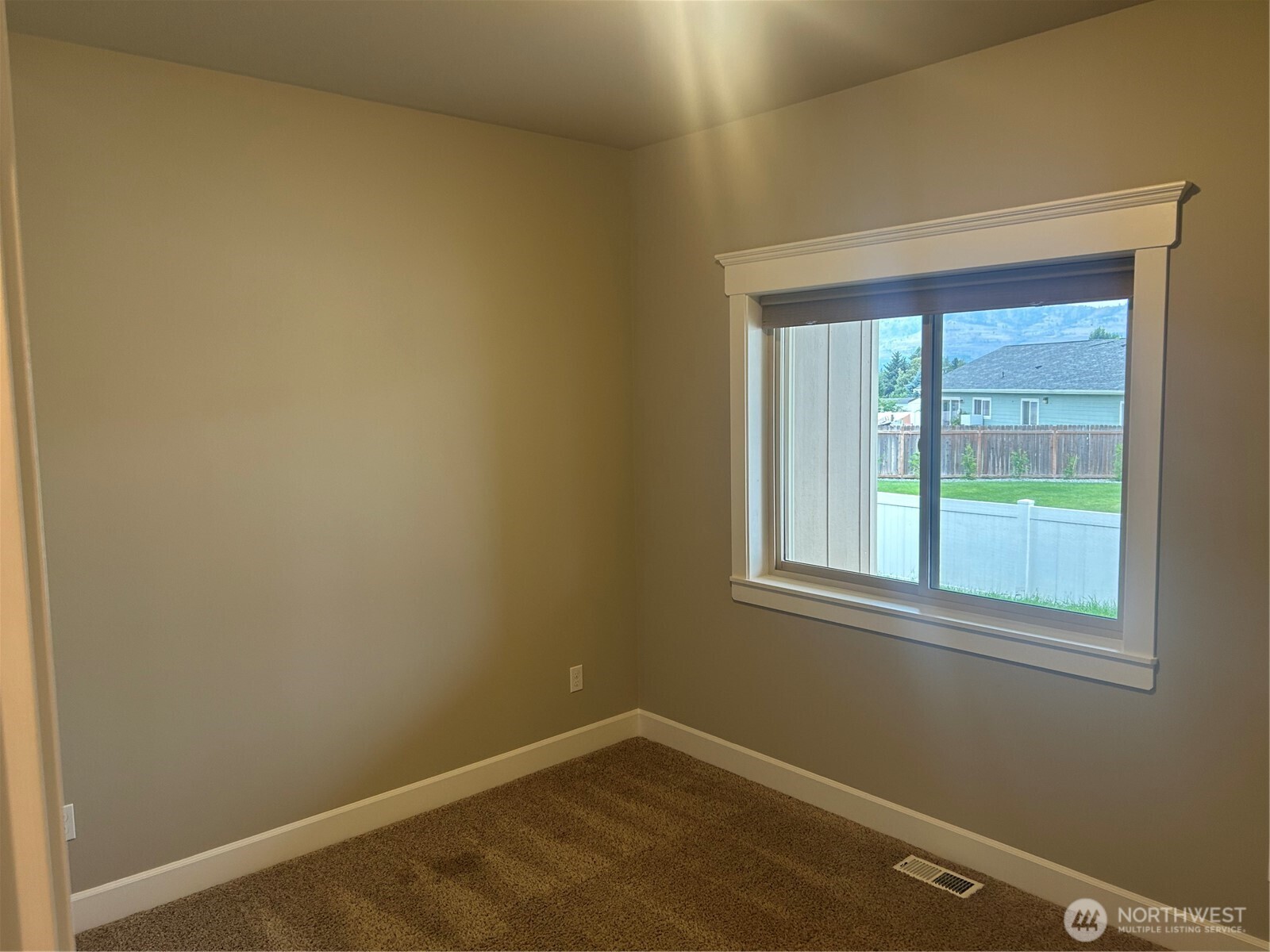 138 Summer Breeze Road Manson, WA 98831 - Photo 14 of 22 an empty room with a window