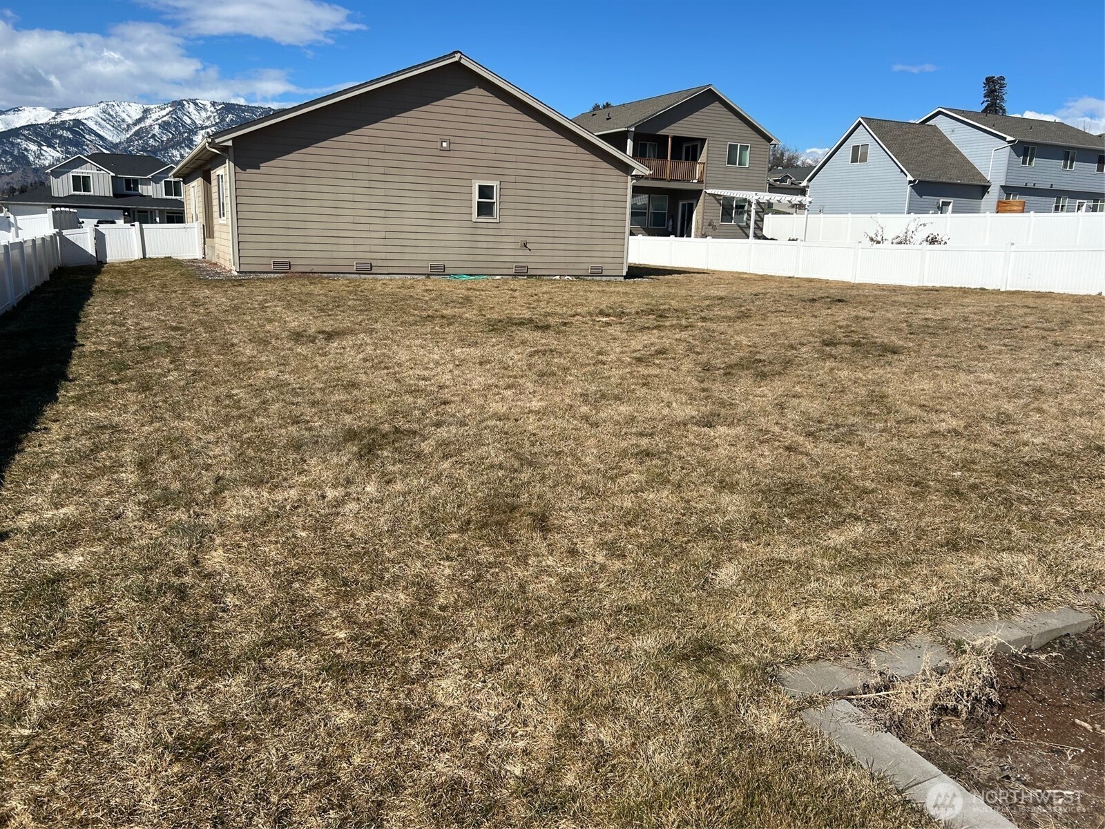 138 Summer Breeze Road Manson, WA 98831 - Photo 8 of 22 a house with a yard