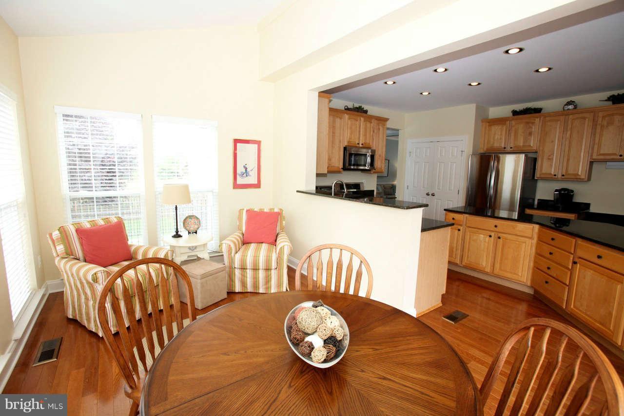 9631 Gerst Road Perry Hall, MD 21128 - Photo 8 of 29 Sunroom with Kitchen Table and Sitting Area