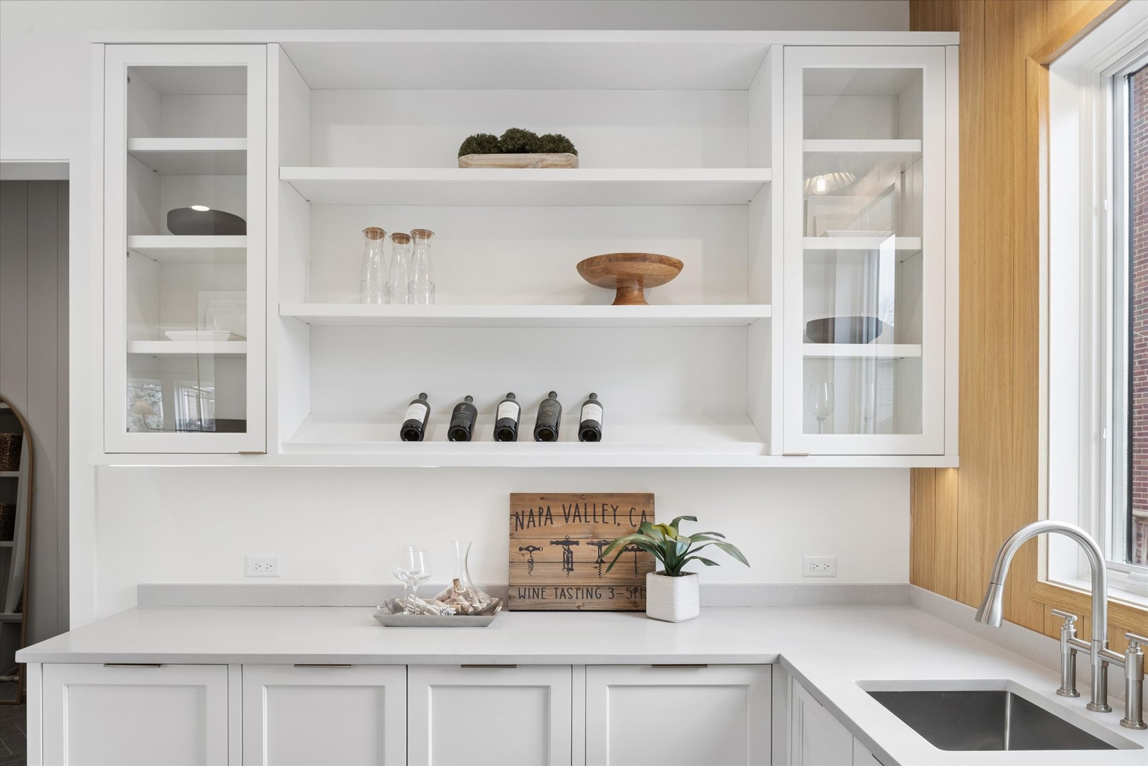 580 Kearsage Avenue Elmhurst, IL 60126 - Photo 20 of 43 a kitchen with white cabinets and a wooden floor