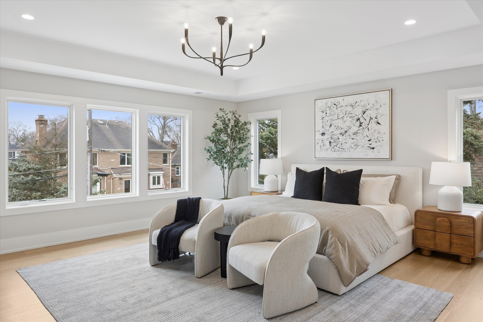 580 Kearsage Avenue Elmhurst, IL 60126 - Photo 25 of 43 a spacious bedroom with a large bed and a large window
