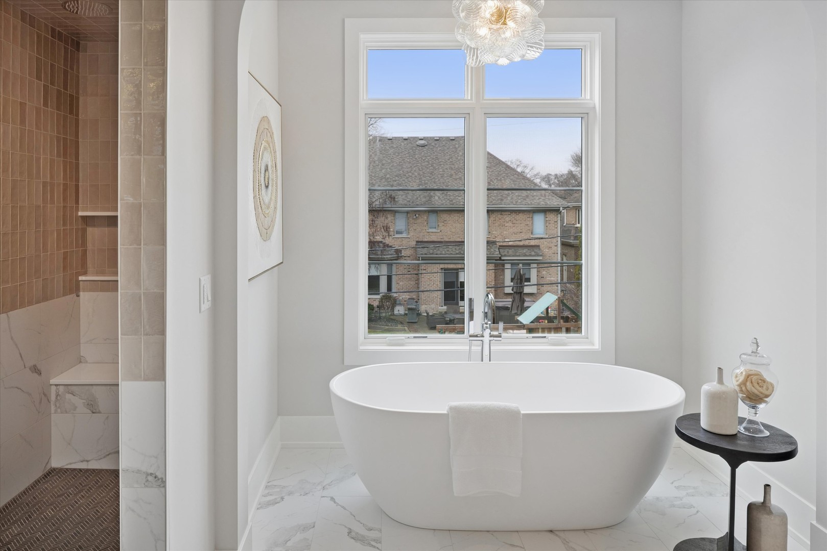 580 Kearsage Avenue Elmhurst, IL 60126 - Photo 29 of 43 a white bath tub sitting in a bathroom next to a window