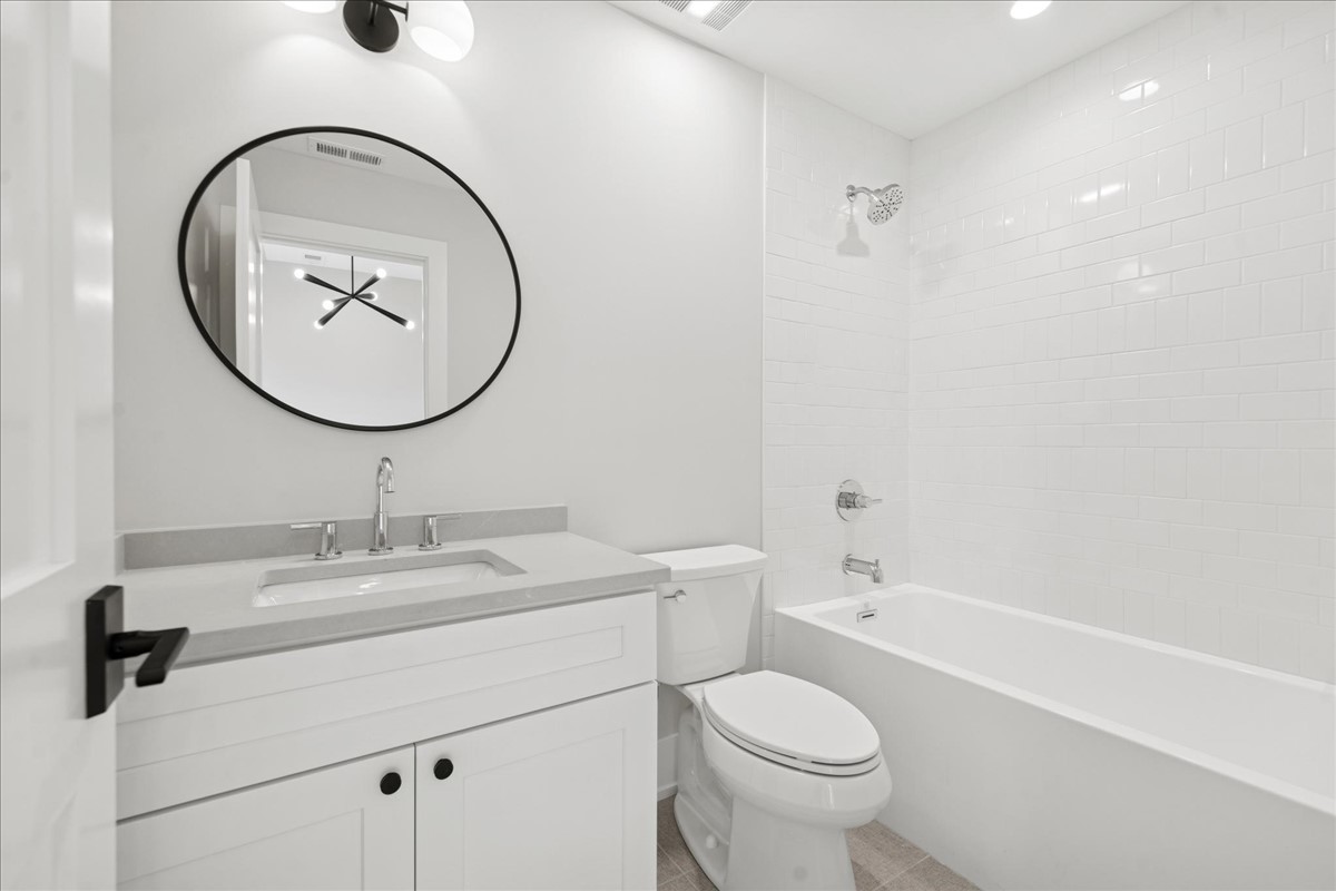 580 Kearsage Avenue Elmhurst, IL 60126 - Photo 34 of 43 a bathroom with a sink a toilet and a mirror