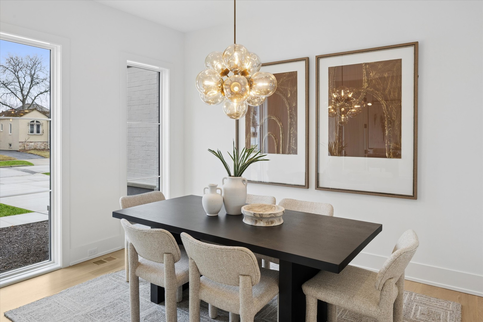 580 Kearsage Avenue Elmhurst, IL 60126 - Photo 4 of 43 a view of a dining room with furniture wooden floor and a chandelier