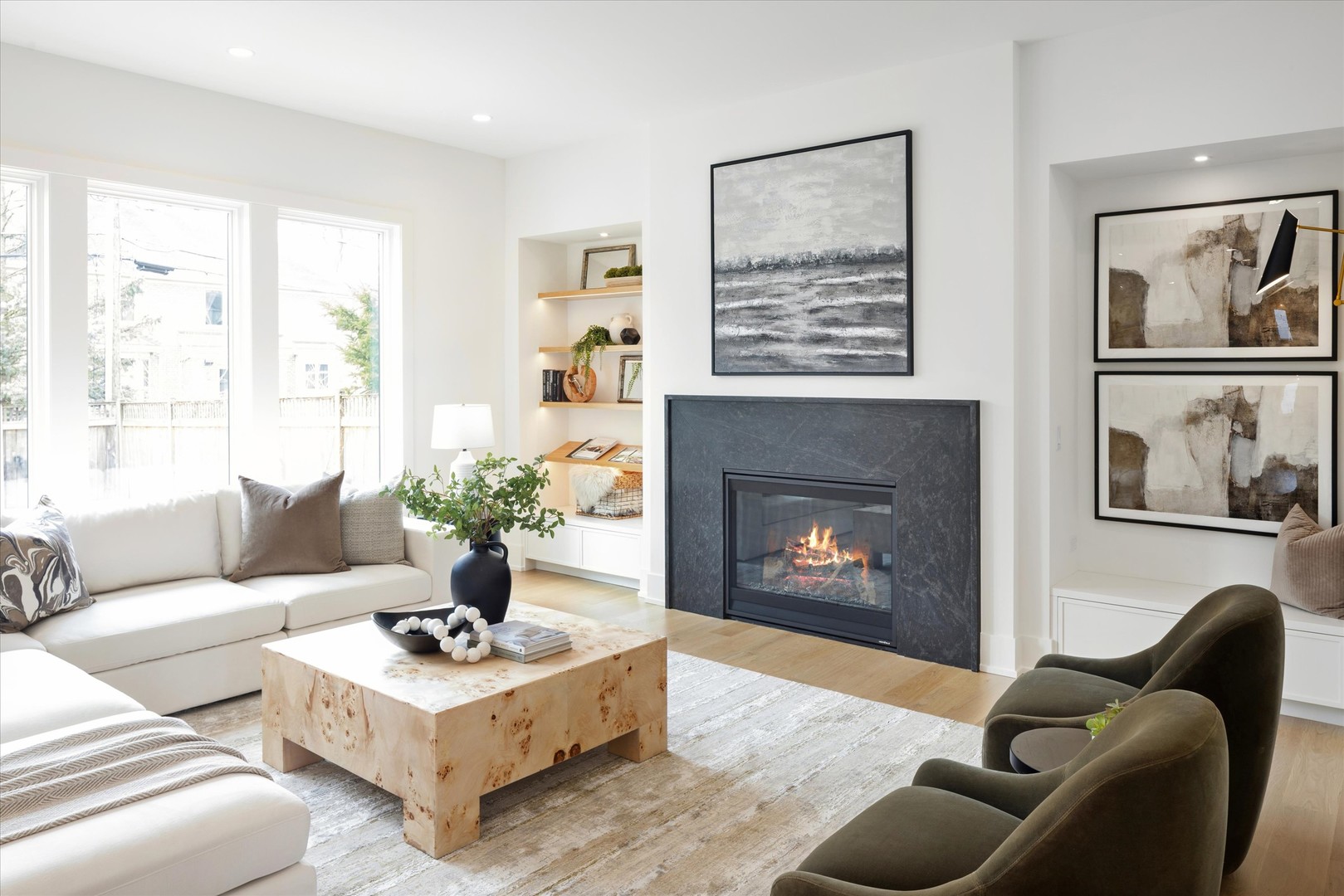 580 Kearsage Avenue Elmhurst, IL 60126 - Photo 8 of 43 a living room with furniture a fireplace and a large window