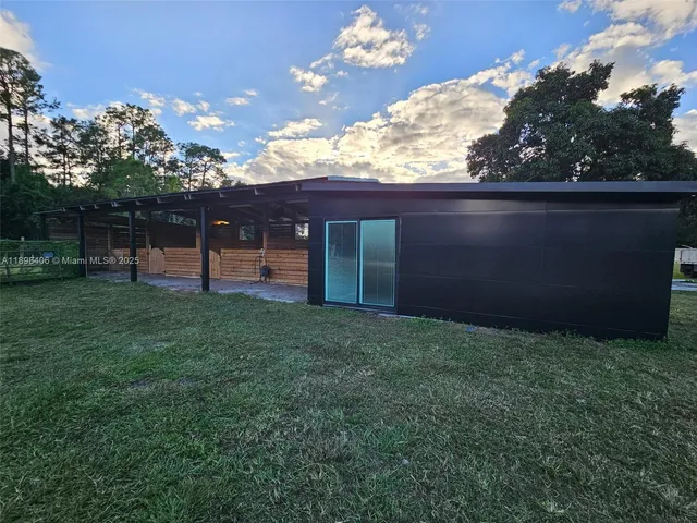 a view of a backyard with a garden
