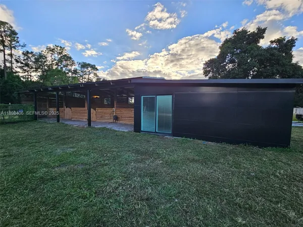 a view of a backyard with a garden